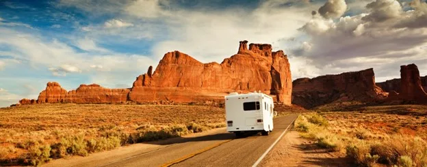 RV on the road with beautiful landscape